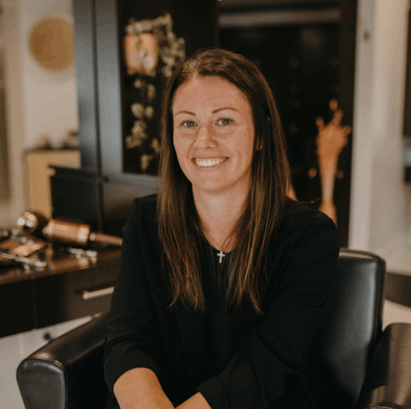 Ashley Elliott sitting in salon studio